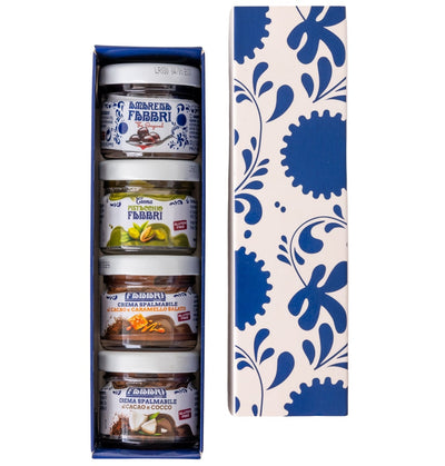 Confezione regalo aperta con minisize Amarena Fabbri, Pistacchio Fabbri, Cacao e Caramello Salato e Cacao e Cocco