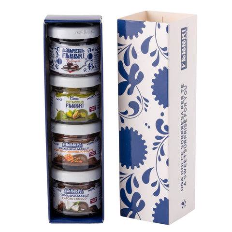 Confezione regalo aperta con minisize Amarena Fabbri, Pistacchio Fabbri, Cacao e Caramello Salato e Cacao e Cocco